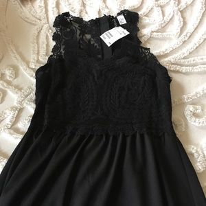 Laced top black mini dress